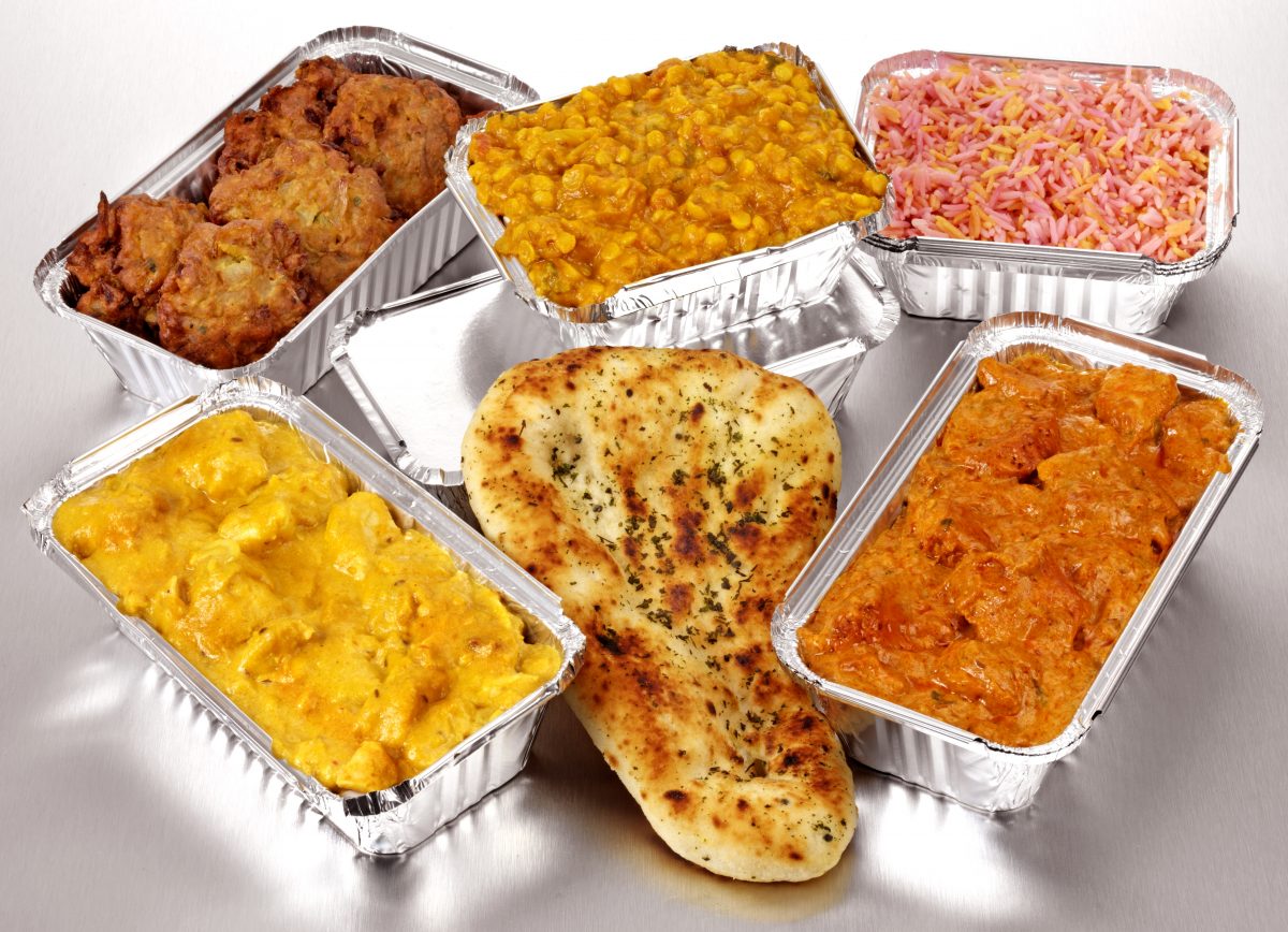 Curry takeaway picture of Indian meals in tin trays